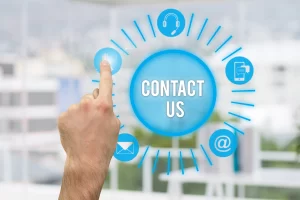 Contact Ascendo Finserve – Trusted Loan Consultant Near Me in Jaipur Contact us concept showing hand pressing virtual button for customer support, phone, email, and loan consultation services